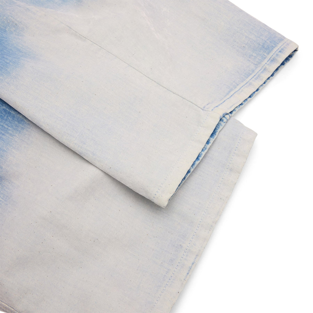 MARNI Flocked Denim Twisted Jeans (Iris Blue)